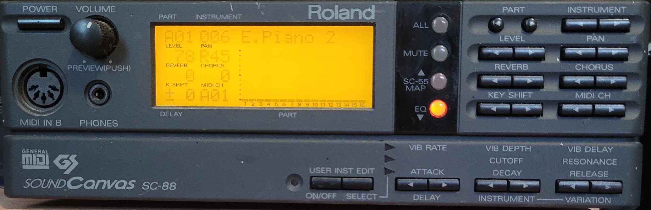 Photo of a Roland Sound Canvas SC-88. It looks similar to a Roland SC-55 or SC-55mkII, but it is vertically extended to be maybe a third taller, with an extra row of buttons for things like User Instrument Editing (abbreviated “User Inst Editing”), “Attack”, “Decay”, “Release“, “Cutoff”, “Resonance”, and various controls for Vibrato (abbreviated “Vib”).